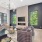 Spacious and well lit clubhouse with plenty of seating and a large TV