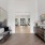 Entryway to cluhouse with bench and sideboard table