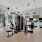 Large fitness center with cardio and weight lifting equipment.