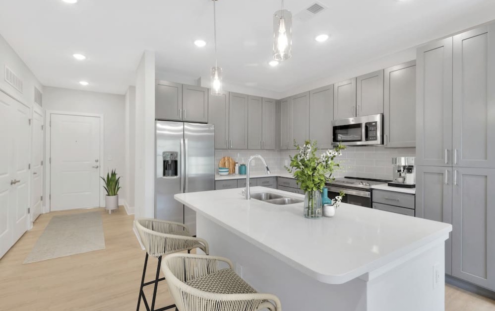 kitchen on wood-style flooring with modern appliances