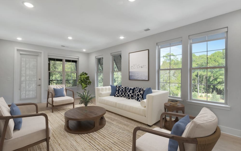 living room with wood-style flooring and bright spaces