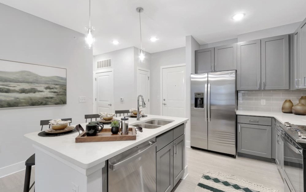 kitchen on wood-style flooring with modern appliances